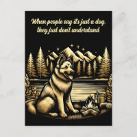 Berger allemand d'or par le feu de camp