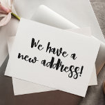 Carte Postale Blanc Noir Minimaliste Nous Avons Déménagé Nouvell<br><div class="desc">Ce minimaliste moderne que nous avons déplacé carte postale faire-part comprend des lettres de brosse amusantes en noir et blanc.</div>