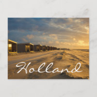 Cabines de plage au coucher du soleil sur la côte