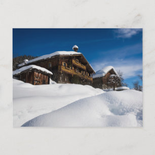 Carte Postale Cabines en bois traditionnelles dans la neige