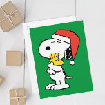 Carte Postale Câlins de vacances de Snoopy & Woodstock | Peanuts<br><div class="desc">Faites rayonner la joie des fêtes avec la carte postale Câlins de vacances de Snoopy & Woodstock de Peanuts ! Avec Snoopy et Woodstock partageant une chaleureuse étreinte, cette carte postale joyeuse est parfaite pour envoyer des vœux de Noël à vos amis et à votre famille. Laissez l'étreinte sincère de...</div>