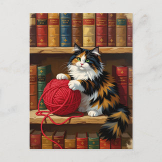 Carte Postale Chat calico jouant avec du fil sur une étagère à l