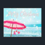 Carte Postale Christmas Holiday Sunshine Beach Scène Parapluie<br><div class="desc">Un accueil de Noël ou de Fêtes au soleil. Une belle scène balnéaire océanique aux couleurs dominantes bleues et au soleil brillant sur un parasol rose. Un ajout lumineux à toute carte de voeux personnalisée Joyeux Noël.</div>