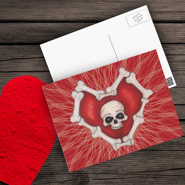Carte Postale Coeur gothique rouge avec le crâne blanc osseux su (Gothic red heart outlined in white bones with skull on red with spidery lines on postcard.)