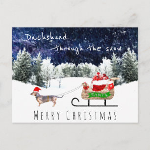 Carte Postale Dachshund à travers la neige mignon chien poste de