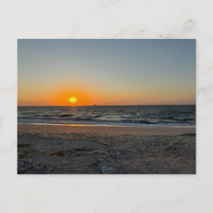 Carte postale de coucher de soleil sur l'océan de