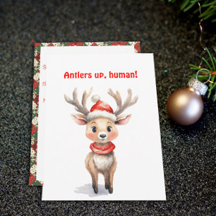 Carte postale de vœux de Noël avec un renne mignon