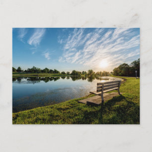 Carte postale du coucher de soleil sur un banc du