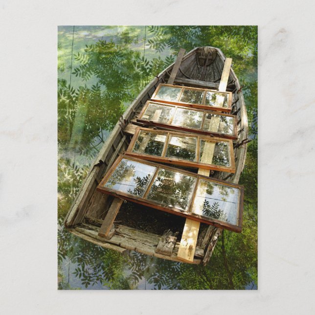 Carte postale d'un bateau en bois dans un lit de f (Devant)