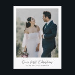 Carte Postale Elegant romantic Our first Christmas photo<br><div class="desc">An elegant romantic calligraphy and a modern design for this photo card. To customize with your favorite couple picture. You can also easily change the color of the font to your liking. Perfect to celebrate your First Christmas as newlyweds or as a couple.</div>
