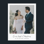 Carte Postale Elegant romantic Our first Christmas photo<br><div class="desc">An elegant romantic calligraphy and a modern design for this photo card. To customize with your favorite couple picture. You can also easily change the color of the font to your liking. Perfect to celebrate your First Christmas as newlyweds or as a couple.</div>