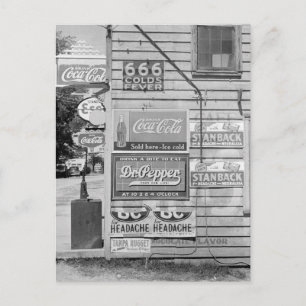 Carte Postale Enseignes sur un magasin général, 1938