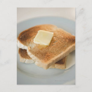 Carte Postale Fermer les toasts avec du beurre dans l'assiette