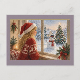 Carte Postale Fille au chapeau de Père Noël à la fenêtre enneigé