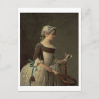 Fille avec la raquette et le chiot