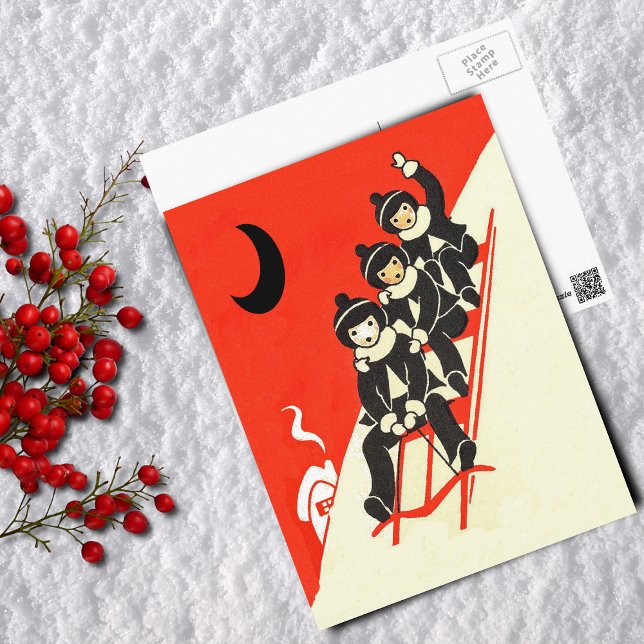 Carte postale Garçons sur une scène hivernale de t (Three boys riding red sled down snow covered hill Black moon house on red Postcard.)