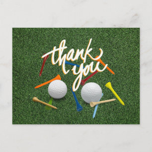 Carte Postale Golf Merci avec balle de golf et tees sur vert