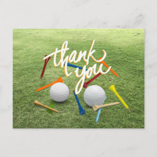 Carte Postale Golf Merci avec balle de golf et tées sur vert