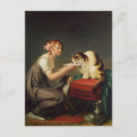 Jeune fille donnant du lait à son art de chat