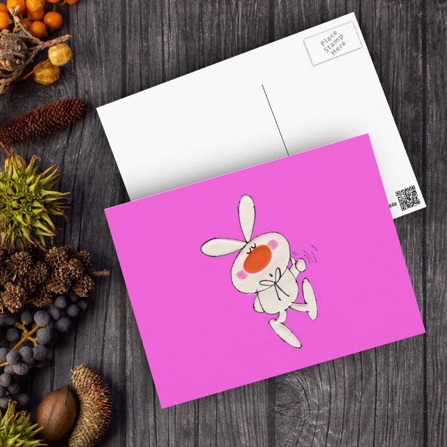 Carte Postale Joyeuse danse mignonne lapin blanc (Cute white bunny orange nose thumbs up sign on vibrant pink postcard.)