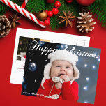 Carte Postale Joyeux Noël Famille Photo White Cursive Script<br><div class="desc">Elégante Carte postale photo de Noël Joyeux avec belle écriture cursive en blanc. Cette carte postale de famille de vacances moderne présente une superbe typographie et votre nom en blanc sur la photo de fond saigné. Ajoutez une 2ème photo festive à l'arrière.</div>
