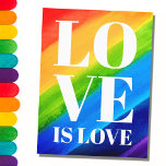 Carte Postale L'amour est l'amour Rainbow Pride<br><div class="desc">Cette carte postale Gay pride est décorée avec LOVE IS LOVE en caractères blancs gras sur un arc-en-ciel d'aquarelle arrière - plan de rouge,  orange,  jaune,  vert,  bleu et violet. Aquarelle originale © Michele Davies.</div>