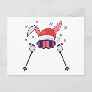 Carte Postale Lapin de Noël skieur avec chapeau de Père Noël et