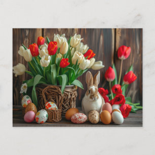 Carte Postale Lapin de Pâques assis à côté d'œufs colorés et de 