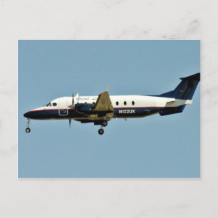 Carte Postale L'avion vole dans le ciel