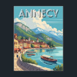 Carte Postale Le lac d'Annecy France<br><div class="desc">Annecy, souvent appelée la "Venise des Alpes", est une ville pittoresque du sud-est de la France connue pour son lac cristallin, ses canaux de charme et son paysage montagneux spectaculaire. Nichée à l'extrémité nord du lac d'Annecy, l'un des lacs les plus propres d'Europe, la ville offre un mélange parfait de...</div>
