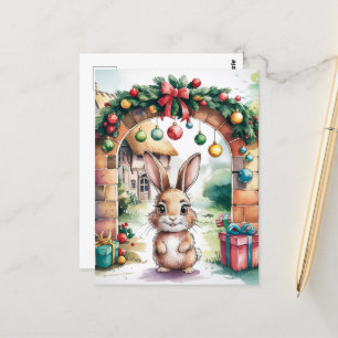 Carte Postale Le mignon lapin de Noël Brown sous une arche