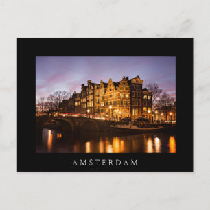 Carte Postale Les maisons du canal d'Amsterdam à la nuit noire c