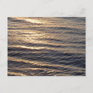 Carte Postale Lever de soleil sur les eaux de l'océan apaisant l