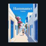 Carte Postale Médina de Hammamet Tunisie<br><div class="desc">La médina de Hammamet est un cœur historique fortifié de la ville, caractérisé par ses murs remarquablement préservés du XVe siècle qui surplombent la mer Méditerranée scintillante. À l'intérieur, un labyrinthe de rues piétonnes étroites et sinueuses révèle un monde serein de maisons traditionnelles blanchies à la chaux ornées de portes...</div>