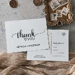 Carte Postale Merci de calligraphie noire simple<br><div class="desc">Cette simple calligraphie noire grâce à votre carte postale est parfaite pour un mariage rustique. Le design minimaliste est doté d'une police de caractères élégante et d'un coeur féminin. Personnalisez l'avant de la carte avec un court message. Personnalisez le dos avec un message de remerciement plus long. Sinon, laissez la...</div>