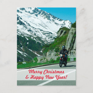 Carte Postale Motocycliste dans les montagnes enneigées Noël