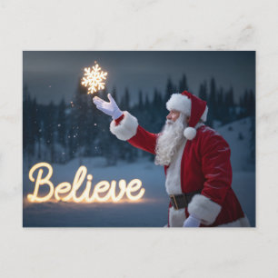 Carte Postale Père Noël tenant un flocon de neige lumineux