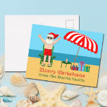 Carte Postale Plage Santa Claus Cute Custom Christmas<br><div class="desc">Cette jolie carte postale de Noël ensoleillée fait la carte postale parfaite pour les beaux jours à la piscine ou à la plage. Faites-en une extravagance amusante sur le thème du pôle nord avec le Père Noël dans ses maillots de bain à côté d'un parapluie de plage rayé rouge et...</div>