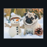 Carte Postale Pug Sitting Next to Snowman<br><div class="desc">pug sitting beside a snowman in a winter setting capturing playful interaction dans the snow.</div>