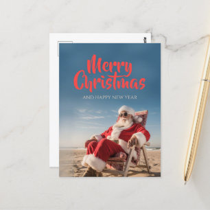 Carte Postale Santa Claus se détendre sur le transat