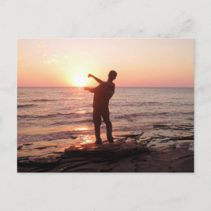 Carte Postale Sauter des rochers dans le coucher du soleil