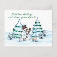 Schneemann mit Katze und Hundewelpe auf Deutsch