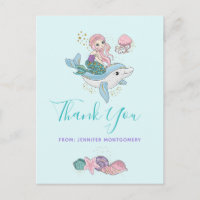 Sirène chevauchant un dauphin sous le Merci marin