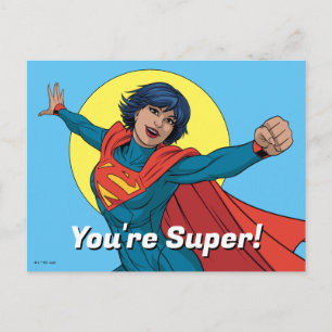 Carte Postale Supergirl volant en costume bleu