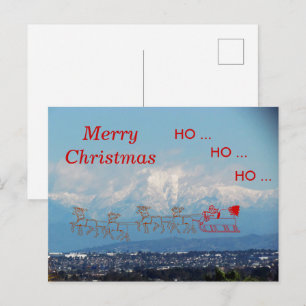 Carte postale – Traîneau et Père Noël au-dessus de