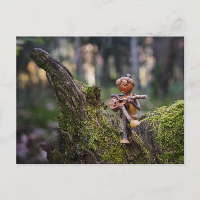 Carte Postale Un guitariste elfe céleste dans la forêt. (Devant)