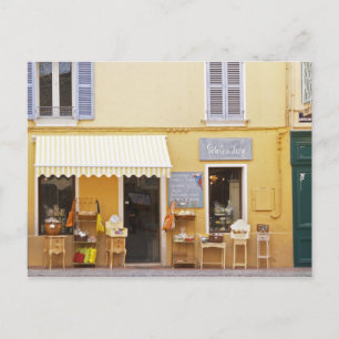 Carte Postale Une rue de marché dans la vieille ville avec un ma