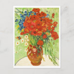 Carte Postale Vase avec Cornflowers et Poppies, Van Gogh<br><div class="desc">Peinte en 1886, cette huile sur toile se caractérise par un parfait mélange de couleur et de brosse. Contre un arrière - plan bleu peint à peine, Van Gogh a peint un vase avec un bouquet de fleurs de maïs bleues intensément colorées, de pavots rouge vif et de marguerites blanches...</div>