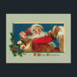 Carte postale vintage Père Noël Christmas<br><div class="desc">L'image charmante de St. Nick a été restaurée à des couleurs vives et originales. Père Noël livre des jouets le soir de Noël enneigé.</div>