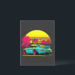 CARTE POSTALE VOITURE SPORTIVE "SURF AU COUCHER DE SOLEIL"<br><div class="desc">Prêt pour les vacances ? Prêt à faire du surf ? Alors prenez votre voiture, mettez vos planches de surf sur le toit, et partez pour un peu de plaisir! C'est le sentiment que j'ai eu quand j'ai regardé ce design, si vous avez envie de vacances ou de s'amuser, faites...</div>